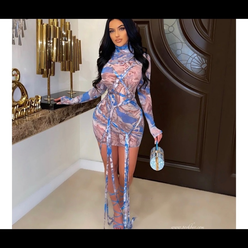 See thru. Blue and brown dress you can tie up